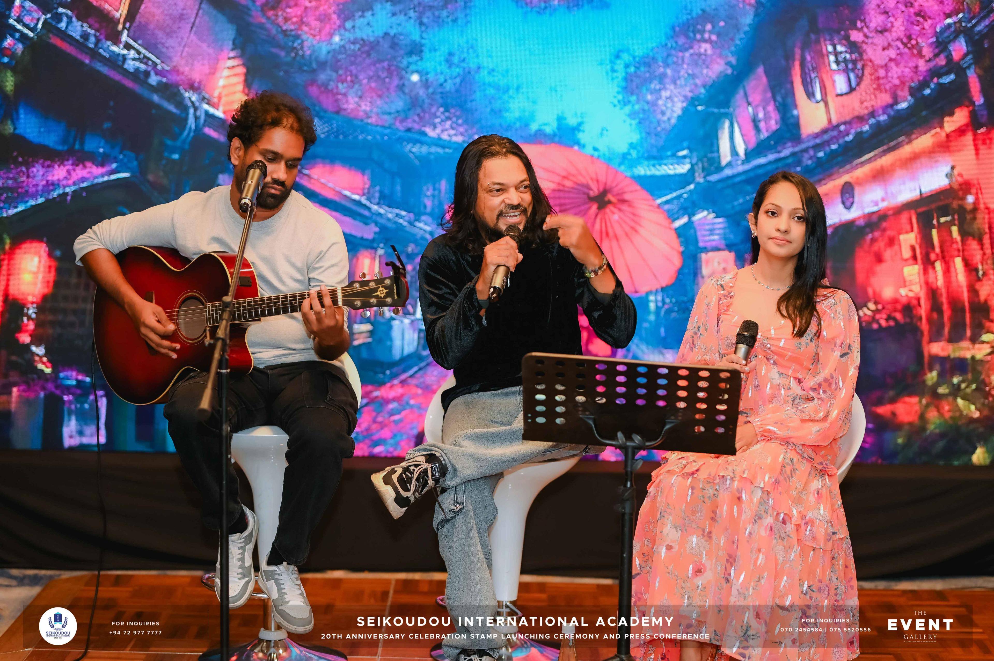 Live acoustic music performance on stage at a corporate celebration